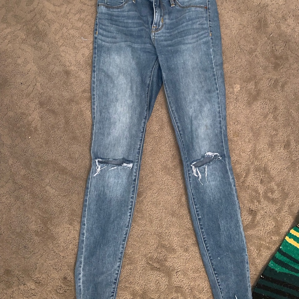 ripped knee denim jeans